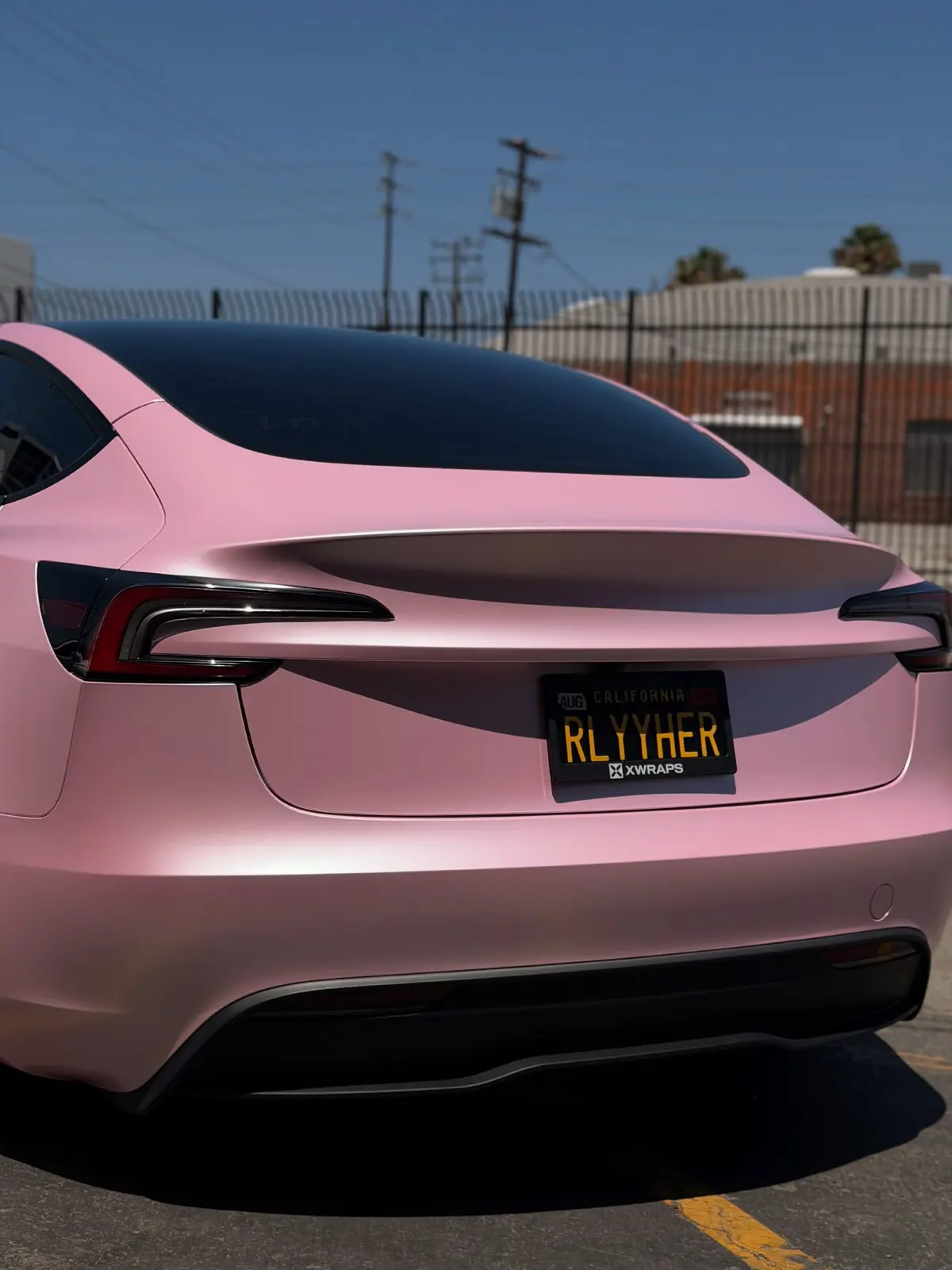 TESLA MODEL 3 — PEARL METALLIC PINK